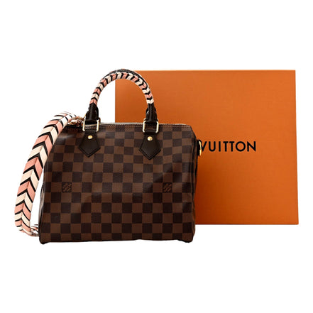 Louis Vuitton Damier Ebene Braided Speedy Bandouliere 25 Pink - available at Queen Bee of Beverly Hills. 