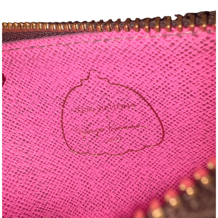 Louis Vuitton x YK Monogram Kusama Pumpkin Zipped Romy Card Holder available at Queen Bee of Beverly Hills