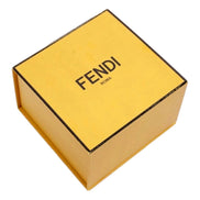 Gold Fendi box with black text on a white background