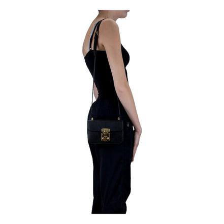 Miu Miu Madras Black Leather Crossbody Bag available at Queen Bee of Beverly Hills