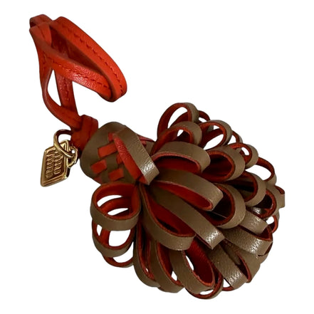 Miu Miu Trick Nappa Leather Pompom Bag Charm Brown and Orange