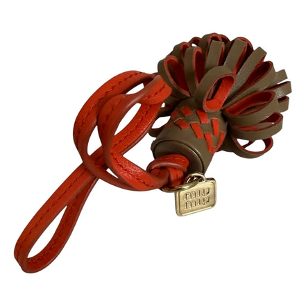 Miu Miu Trick Nappa Leather Pompom Bag Charm Brown and Orange