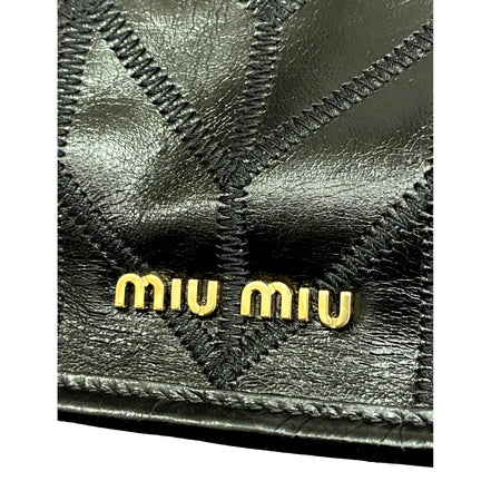 Miu Miu Vitello Shine Patch Black Leather Satchel Bag available at Queen Bee of Beverly Hills