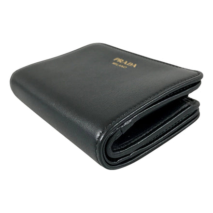 Prada Soft Calfskin Nero Black Leather Small Snap Wallet with Zipper available at Queen Bee of Beverly Hills