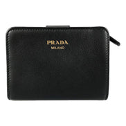 Prada Soft Calfskin Nero Black Leather Small Snap Wallet with Zipper available at Queen Bee of Beverly Hills