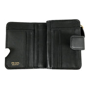 Prada Soft Calfskin Nero Black Leather Small Snap Wallet with Zipper available at Queen Bee of Beverly Hills