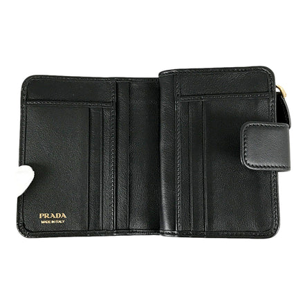 Prada Soft Calfskin Nero Black Leather Small Snap Wallet with Zipper available at Queen Bee of Beverly Hills