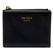 Prada Soft Calfskin Snap Bifold Zip Coin Pocket Wallet Black - available at Queen Bee of Beverly Hills. 