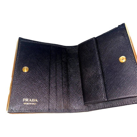 Prada Saffiano Leather Gold Metal Trim Snap Bifold Wallet Black available at Queen Bee of Beverly Hills