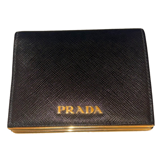 Prada Saffiano Leather Gold Metal Trim Snap Bifold Wallet Black available at Queen Bee of Beverly Hills