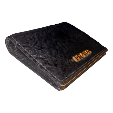 Prada Saffiano Leather Gold Metal Trim Snap Bifold Wallet Black available at Queen Bee of Beverly Hills