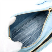 Prada 2Way Tessuto Nylon Cielo Blue Ostrich Leather Handbag available at Queen Bee of Beverly Hills