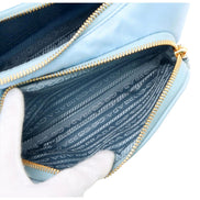 Prada 2Way Tessuto Nylon Cielo Blue Ostrich Leather Handbag available at Queen Bee of Beverly Hills