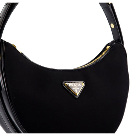 Prada Arqué Re-Nylon and Brushed Leather Black Shoulder Bag available at Queen Bee of Beverly Hills