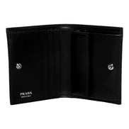 Prada Bifold Black Polished Leather Triangle Logo Card Holder Wallet available at Queen Bee of Beverly Hills