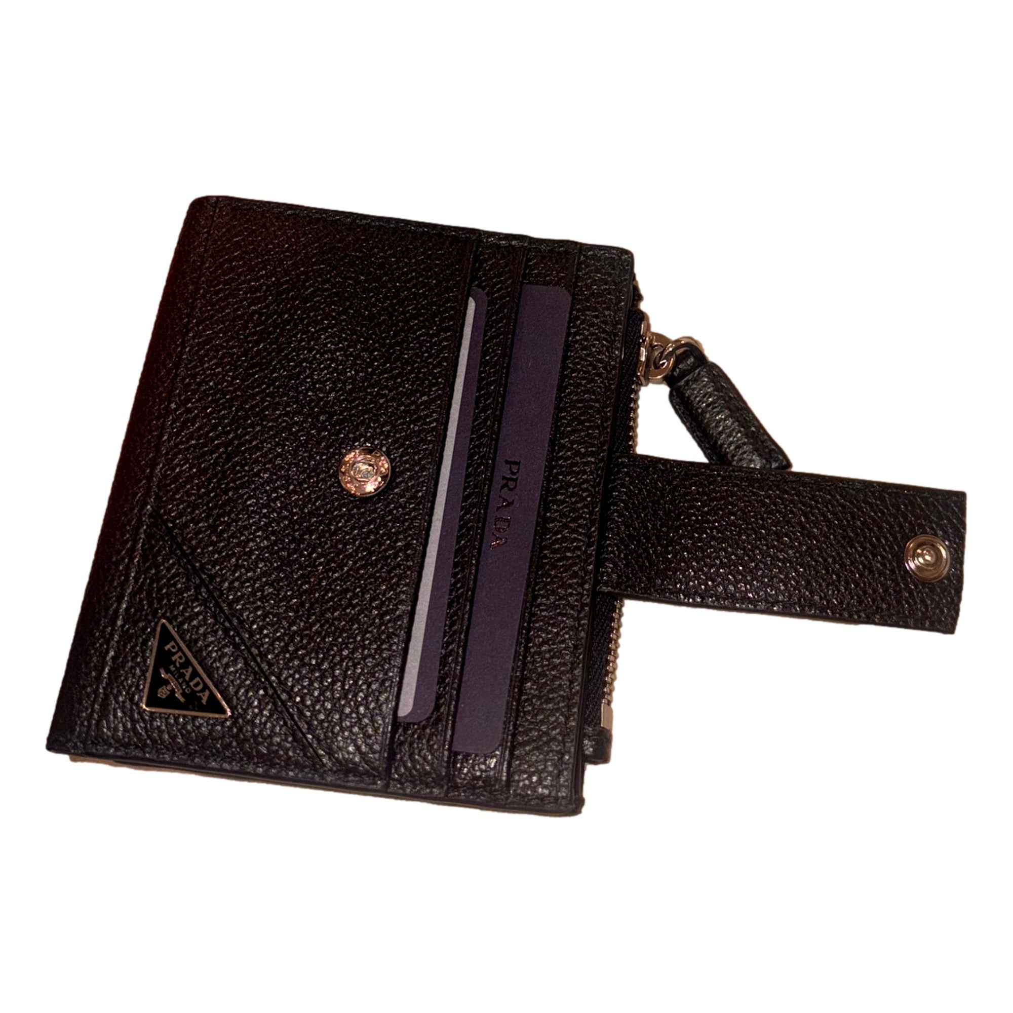 Prada Black Vitello Grain Leather Card Case Bifold Wallet with Zipper Coin Pouch available at Queen Bee of Beverly Hills