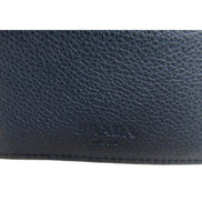 Prada Black Vitello Micro Grain Leather Bifold Wallet Triangle Enamel Logo available at Queen Bee of Beverly Hills