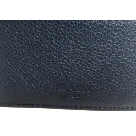 Prada Black Vitello Micro Grain Leather Bifold Wallet Triangle Enamel Logo available at Queen Bee of Beverly Hills