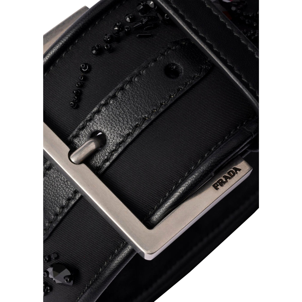 Prada Black Re-Nylon Buckle Wrist Strap with Beaded Embroidery and Leather Trim - available at Queen Bee of Beverly Hills. 