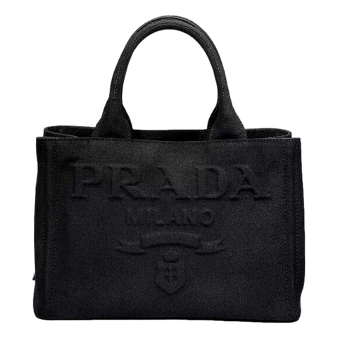 Prada Canapa Tote Handbag Canvas Embossed Lettering Logo Fabric Black available at Queen Bee of Beverly Hills