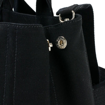 Prada Canapa Tote Handbag Canvas Embossed Lettering Logo Fabric Black available at Queen Bee of Beverly Hills