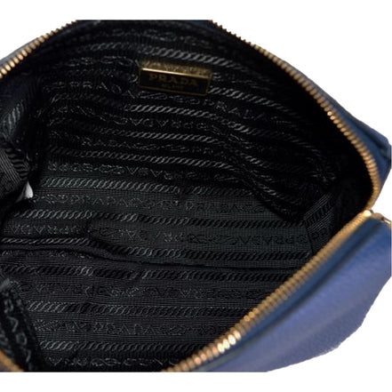 Prada Contenitore Baltico Navy Blue Vitello Daino Vanity Case available at Queen Bee of Beverly Hills