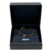 Bracelet in a Prada box on a white background