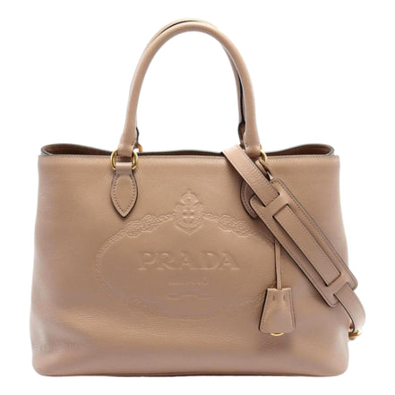 Prada Embossed Logo Soft Leather Handbag Shopper Tote Cammeo Beige available at Queen Bee of Beverly Hills