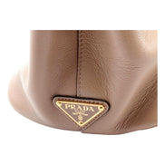 Prada Embossed Logo Soft Leather Handbag Shopper Tote Cammeo Beige available at Queen Bee of Beverly Hills