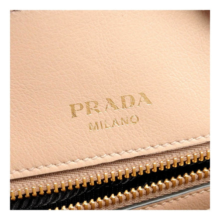 Prada Embossed Logo Soft Leather Handbag Shopper Tote Cammeo Beige available at Queen Bee of Beverly Hills