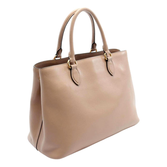 Prada Embossed Logo Soft Leather Handbag Shopper Tote Cammeo Beige available at Queen Bee of Beverly Hills
