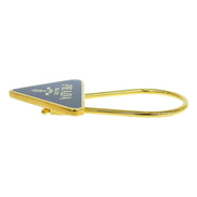 Prada Enameled Metal Logo Pin Key Ring Black and Gold Purse Charm available at Queen Bee of Beverly Hills