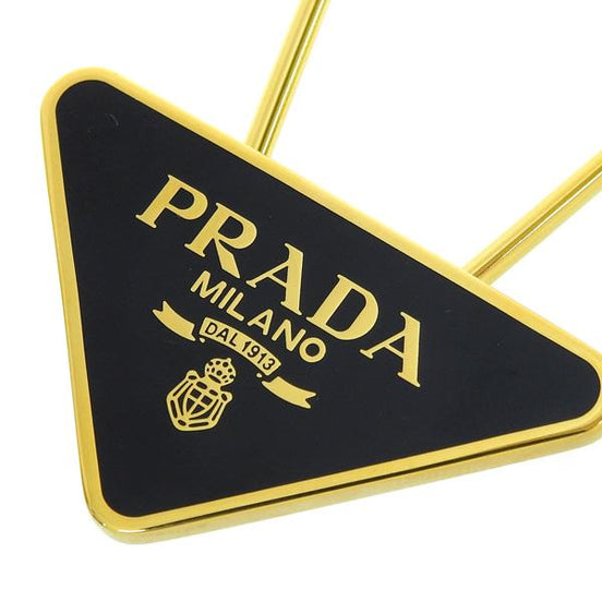 Prada Enameled Metal Logo Pin Key Ring Black and Gold Purse Charm available at Queen Bee of Beverly Hills