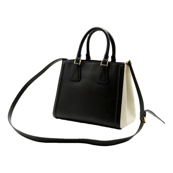 Prada Nero Black Ivory Saffiano Leather 2-Way Tote Bag - available at Queen Bee of Beverly Hills. 