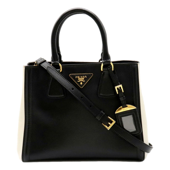 Prada Nero Black Ivory Saffiano Leather 2-Way Tote Bag - available at Queen Bee of Beverly Hills. 