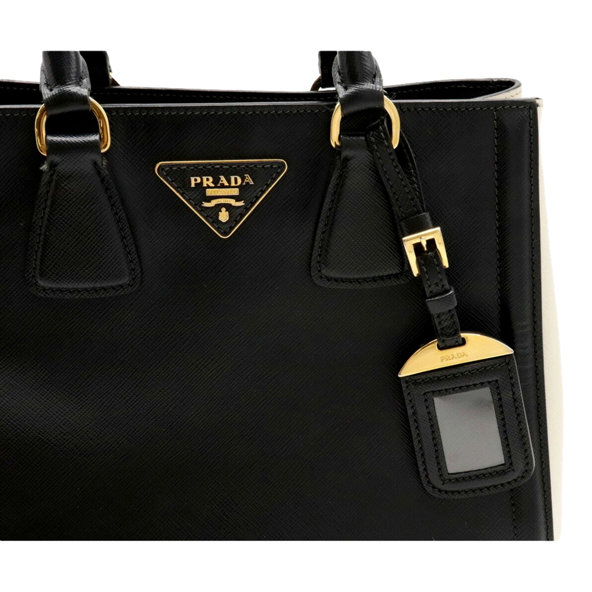 Prada Nero Black Ivory Saffiano Leather 2-Way Tote Bag - available at Queen Bee of Beverly Hills. 