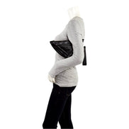 Prada Grace Triangle Leather Pouch Clutch Bag with Embossed Logo Nero Black available at Queen Bee of Beverly Hills