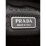 Prada Grace Triangle Leather Pouch Clutch Bag with Embossed Logo Nero Black available at Queen Bee of Beverly Hills