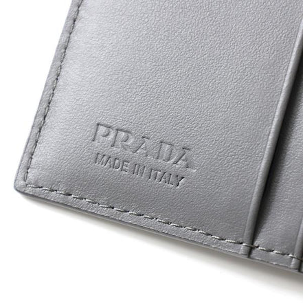 Prada Marmo Marble Grey Vitello Daino Leather Silver Triangle Logo Bifold Wallet available at Queen Bee of Beverly Hills