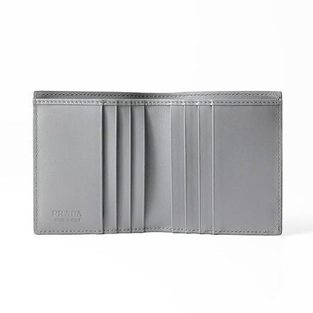 Prada Marmo Marble Grey Vitello Daino Leather Silver Triangle Logo Bifold Wallet available at Queen Bee of Beverly Hills