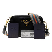 Prada Milano Vitello Phenix Nero Leather Crossbody Bag Web Stripe Strap available at Queen Bee of Beverly Hills