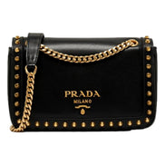 Prada Pattina Black Calf Leather Studded Flap Chain Crossbody Bag available at Queen Bee of Beverly Hills