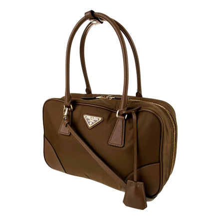 Prada Re-Edition 1978 Medium Re-Nylon and Saffiano Leather Two-Handle Bag Cork Beige - available at Queen Bee of Beverly Hills. 