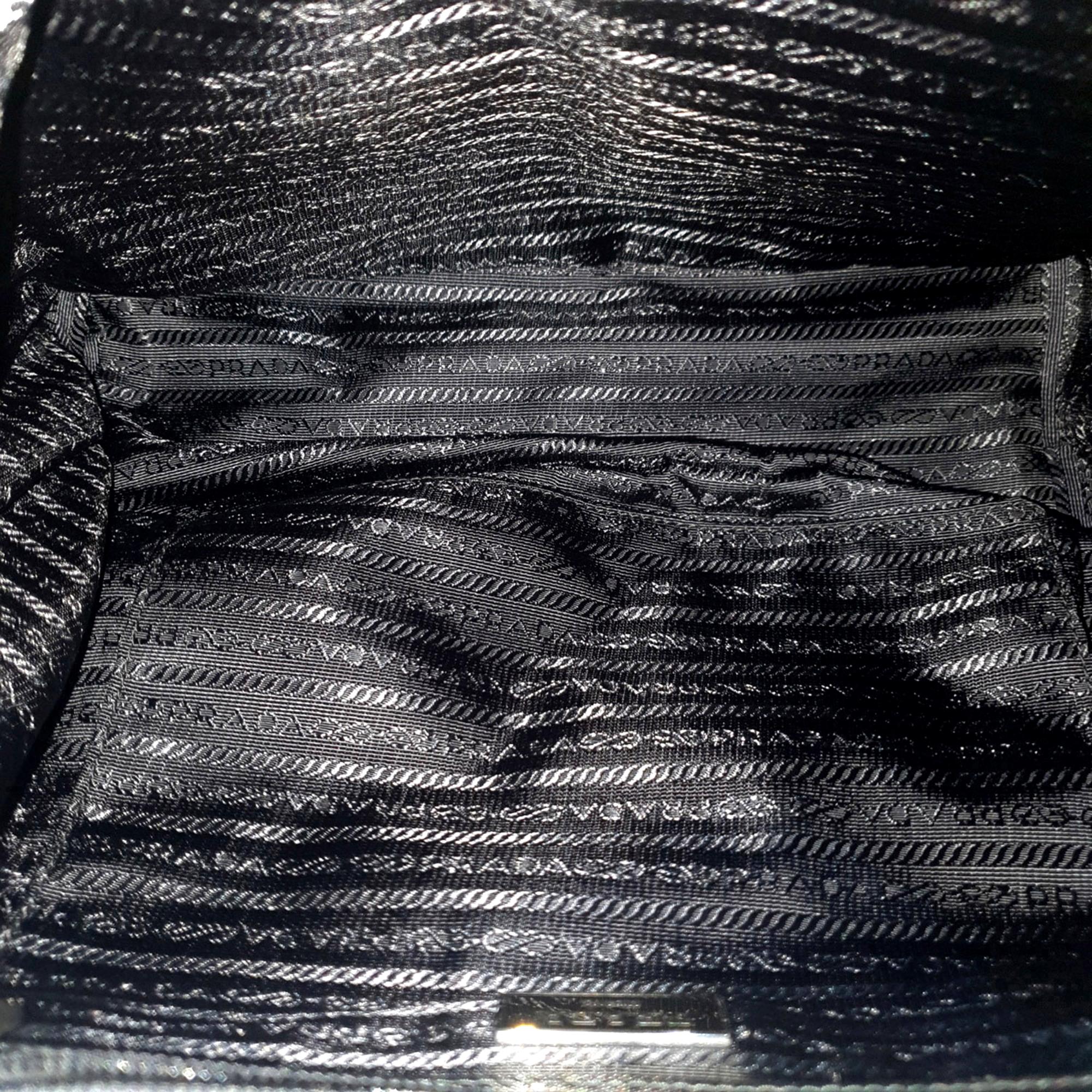 Prada Re-Nylon Black Drawstring Small Rucksack Backpack available at Queen Bee of Beverly Hills