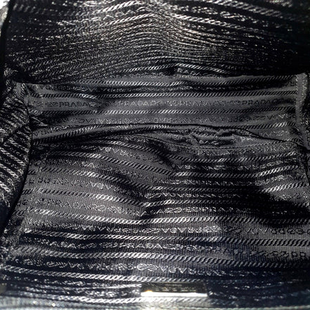 Prada Re-Nylon Black Drawstring Small Rucksack Backpack available at Queen Bee of Beverly Hills