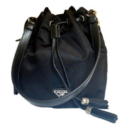 Prada Re-Nylon Black Tassel Drawstring Bucket Bag available at Queen Bee of Beverly Hills