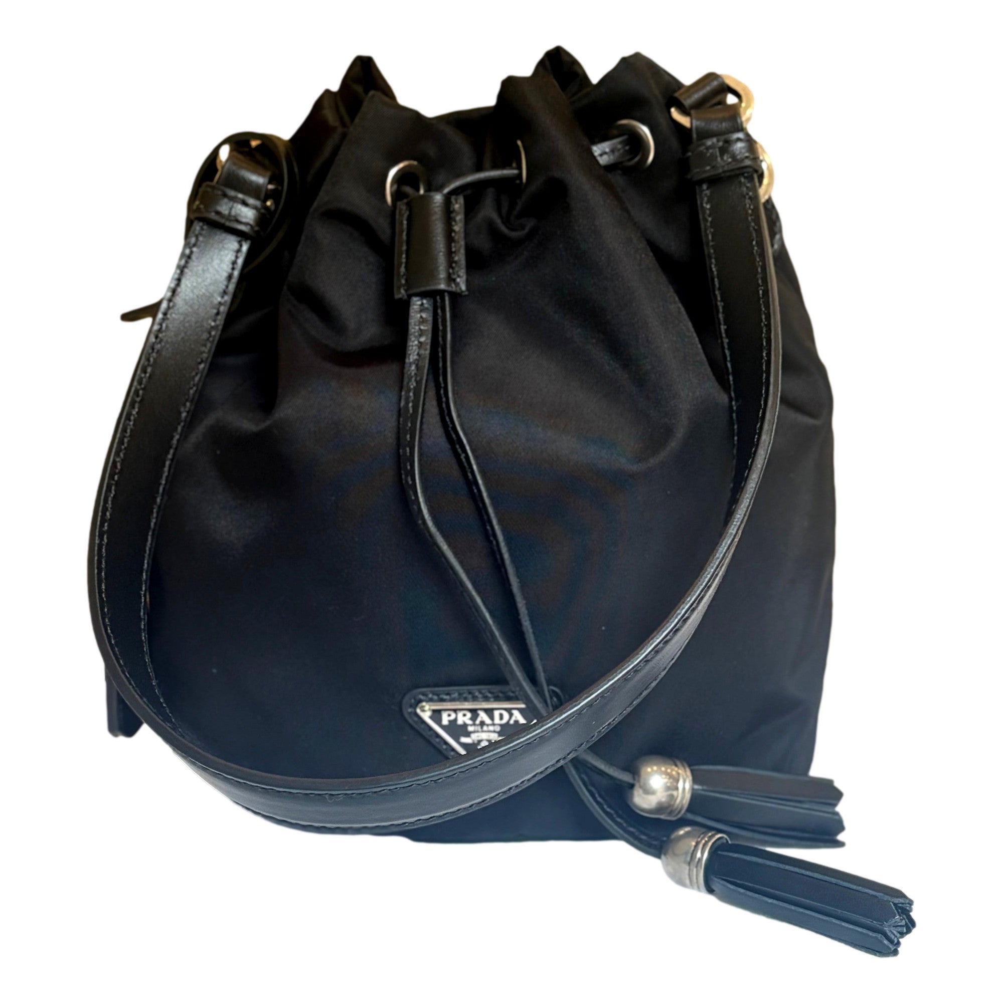 Prada Re-Nylon Black Tassel Drawstring Bucket Bag available at Queen Bee of Beverly Hills
