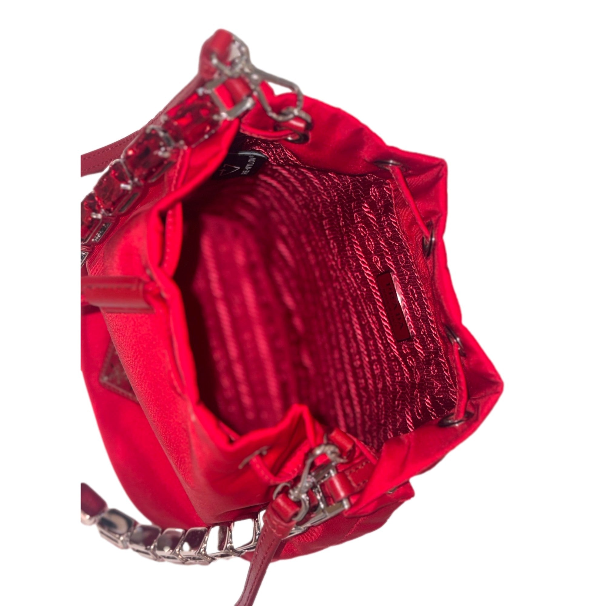 Prada Re-Nylon Rosso Red Drawstring Bucket Bag Embellished Crystal Handle available at Queen Bee of Beverly Hills