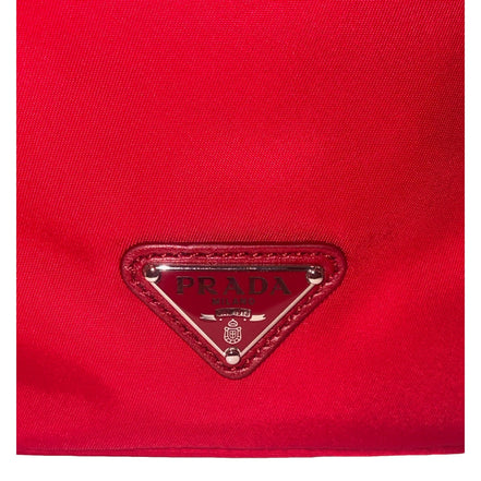 Prada Re-Nylon Rosso Red Drawstring Bucket Bag Embellished Crystal Handle available at Queen Bee of Beverly Hills