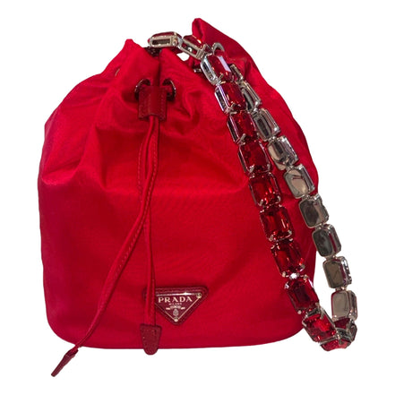 Prada Re-Nylon Rosso Red Drawstring Bucket Bag Embellished Crystal Handle available at Queen Bee of Beverly Hills